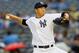 Jul 12, 2013; Bronx, NY, USA; New York Yankees starting pitcher Hiroki Kuroda (18) pitches during the first inning against the Minnesota Twins at Yankee Stadium. Mandatory Credit: Anthony Gruppuso-USA TODAY Sports