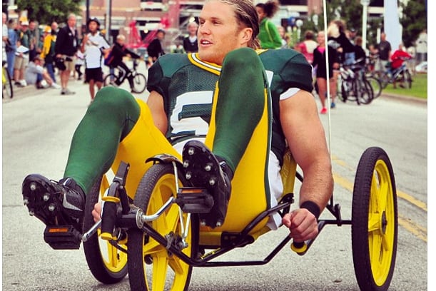 The Green Bay Packers Ride Kids' Bikes to Work