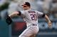 ANAHEIM, CA - JUNE 01: Bud Norris #20 of the Houston Astros throws a pitch against the Los Angeles Angels of Anaheim at Angel Stadium of Anaheim on June 1, 2013 in Anaheim, California. (Photo by Stephen Dunn/Getty Images)