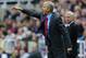 NEWCASTLE UPON TYNE, ENGLAND - MAY 19: Managers Arsene Wenger (L) of Arsenal issues instructions to his players as Alan Pardew of Newcastle looks on during the Barclays Premier League match between Newcastle United and Arsenal at St James' Park on May 19, 2013 in Newcastle upon Tyne, England. (Photo by Stu Forster/Getty Images)