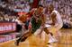 MIAMI, FL - APRIL 21: Brandon Jennings #3 of the Milwaukee Bucks drives on Mario Chalmers #15 of the Miami Heat during Game 1 of the Eastern Conference Quarterfinals of the 2013 NBA Playoffs at American Airlines Arena on April 21, 2013 in Miami, Florida. NOTE TO USER: User expressly acknowledges and agrees that, by downloading and or using this photograph, User is consenting to the terms and conditions of the Getty Images License Agreement. (Photo by Mike Ehrmann/Getty Images)