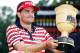 AKRON, OH - AUGUST 05: Keegan Bradley celebrates with the Gary Player cup during the trophy presentation after winning the World Golf Championships-Bridgestone Invitational at Firestone Country Club South Course on August 5, 2012 in Akron, Ohio. (Photo by Gregory Shamus/Getty Images)