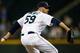SEATTLE, WA - JULY 25: Relief pitcher Oliver Perez #59 of the Seattle Mariners pitches against the Minnesota Twins in the ninth inning at Safeco Field on July 25, 2013 in Seattle, Washington. The Mariners defeated the Twins 8-2. (Photo by Otto Greule Jr/Getty Images)