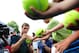 Jul 30, 2013; Washington, D.C., USA; Ryan Harrison (USA) signs autographs for fans after defeating Lleyton Hewitt (AUS) in straight sets during the Citi Open at the William H.G. FitzGerald Tennis Center. Mandatory Credit: Evan Habeeb-USA TODAY Sports