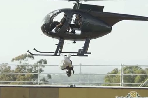 Watch Bob Burnquist Cheat Death, Do Tricks off Helicopter