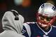 FOXBORO, MA - JANUARY 20: Tom Brady #12 talks with head coach Bill Belichick of the New England Patriots against the Baltimore Ravens during the 2013 AFC Championship game at Gillette Stadium on January 20, 2013 in Foxboro, Massachusetts. (Photo by Elsa/Getty Images)