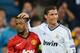 MADRID, SPAIN - FEBRUARY 13: Patrice Evra of Manchester United and Cristiano Ronaldo of Real Madrid at the final whistle during the UEFA Champions League Round of 16 first leg match between Real Madrid and Manchester United at Estadio Santiago Bernabeu on February 13, 2013 in Madrid, Spain. (Photo by Mike Hewitt/Getty Images)
