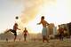 RIO DE JANEIRO, BRAZIL - JUNE 05: Men play football on Ipanema beach ahead of the FIFA Confederations Cup Brazil 2013 on June 5, 2013 in Rio de Janeiro, Brazil. (Photo by Michael Regan/Getty Images)