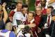 Jan 7, 2013; Miami, FL, USA; Alabama Crimson Tide head coach Nick Saban and quarterback A.J. McCarron (10) celebrate after the 2013 BCS Championship game against the Notre Dame Fighting Irish at Sun Life Stadium. Alabama won 42-14. Mandatory Credit: Robert Mayer-USA TODAY Sports