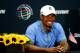Aug 2, 2013; Akron, OH, USA; Tiger Woods speaks to reporters after tying the course record with a score of 61 after the second round of the World Golf Championships - Bridgestone Invitational at Firestone Country Club. Mandatory Credit: Debby Wong-USA TODAY Sports