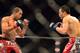 Aug 3, 2013; Rio De Janeiro, Brazil; Jose Aldo (red gloves) fights Chan Sung Jung (blue gloves) during UFC 163 at HSBC Arena. Mandatory Credit: Jason Silva-USA TODAY Sports