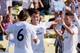 LOS ANGELES, CA - AUGUST 03: Cristiano Ronaldo #7 of Real Madrid celebrates his goal with teammates Sami Khedira #6 and Mesut Ozil #10 against goalkeeper Tim Howard #24 of Everton during the first half of the 2013 Guinness International Champions Cup at Dodger Stadium on August 3, 2013 in Los Angeles, California (Photo by Kevork Djansezian/Getty Images)