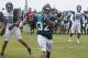 Jul 31, 2013; Jacksonville, FL, USA; Jacksonville Jaguars running back Maurice Jones-Drew (32) scores as he gets past defensive ends Jason Babin (58) and Andre Branch (90) during the first day of training camp in pads at EverBank Field. Mandatory Credit: Phil Sears-USA TODAY Sports