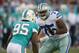 Aug 4, 2013; Canton, OH, USA; Dallas Cowboys defensive tackle Darrion Weems (75) defends against Miami Dolphins defensive end Dion Jordan (95) in the 2013 Hall of Fame Game at Fawcett Stadium. Mandatory Credit: Kirby Lee-USA TODAY Sports