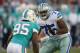 Aug 4, 2013; Canton, OH, USA; Dallas Cowboys defensive tackle Darrion Weems (75) defends against Miami Dolphins defensive end Dion Jordan (95) in the 2013 Hall of Fame Game at Fawcett Stadium. Mandatory Credit: Kirby Lee-USA TODAY Sports