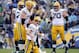 SAN DIEGO, CA - NOVEMBER 06: Aaron Rodgers #12, Bryan Bulaga #75, and T.J. Lang #70 of the Green Bay Packers react to an incomplete pass from pass interference against the San Diego Chargers at Qualcomm Stadium on November 6, 2011 in San Diego, California. (Photo by Harry How/Getty Images)