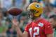 Jul 26, 2013; Green Bay, WI, USA; Green Bay Packers quarterback Aaron Rodgers works out during opening day of training camp at Nitschke Field. Mandatory Credit: Benny Sieu-USA TODAY Sports