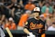 BALTIMORE, MD - AUGUST 02: Manny Machado #13 of the Baltimore Orioles tosses his bat after striking out in the eighth inning against the Seattle Mariners at Oriole Park at Camden Yards on August 2, 2013 in Baltimore, Maryland. (Photo by Greg Fiume/Getty Images)
