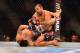 Aug 3, 2013; Rio De Janeiro, Brazil; Jose Aldo (red gloves) fights Chan Sung Jung (blue gloves) during UFC 163 at HSBC Arena. Mandatory Credit: Jason Silva-USA TODAY Sports