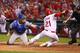 ST. LOUIS, MO - AUGUST 5: Allen Craig #21 of the St. Louis Cardinals is tagged out at home by A.J. Ellis #17 of the Los Angeles Dodgers in the fifth inning at Busch Stadium on August 5, 2013 in St. Louis, Missouri. The Dodgers beat the cardinals 3-2. (Photo by Dilip Vishwanat/Getty Images)