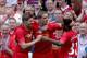 LIVERPOOL, ENGLAND - AUGUST 03: Jordan Henderson of Liverpool is congratulated by Steven Gerrard and Raheem Sterling after scoring the winning goal during the Steven Gerrard Testimonial Match between Liverpool and Olympiacos at Anfield on August 03, 2013 in Liverpool, England. (Photo by Clive Brunskill/Getty Images)