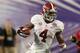 Jan 7, 2013; Miami, FL, USA; Alabama Crimson Tide running back T.J. Yeldon (4) runs with the ball against the Notre Dame Fighting Irish during the 2013 BCS Championship game at Sun Life Stadium. Alabama won 42-14. Mandatory Credit: Matthew Emmons-USA TODAY Sports