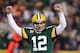 GREEN BAY, WI - JANUARY 05: Quarterback Aaron Rodgers #12 of the Green Bay Packers celebrates after fullback John Kuhn #30 scores on a three-yard touchdown run in the second quarter against the Minnesota Vikings during the NFC Wild Card Playoff game at Lambeau Field on January 5, 2013 in Green Bay, Wisconsin. (Photo by Andy Lyons/Getty Images)