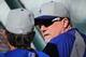 DENVER, CO - MAY 31: Hitting coach Mark McGwire (R) #12 of the Los Angeles Dodgers watches batting practice prior to facing the Colorado Rockies at Coors Field on May 31, 2013 in Denver, Colorado. (Photo by Doug Pensinger/Getty Images)