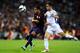 BARCELONA, SPAIN - SEPTEMBER 22: Alexis Sanchez of FC Barcelona (L) duels for the ball with Guilherme Siqueira of Granada CF during the La Liga match between FC Barcelona and Granada CF at Camp Nou on September 22, 2012 in Barcelona, Spain. (Photo by David Ramos/Getty Images)
