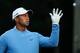 ROCHESTER, NY - AUGUST 06: Tiger Woods of the United States catches a golf ball on the practice range during a practice round prior to the start of the 95th PGA Championship at Oak Hill Country Club on August 6, 2013 in Rochester, New York. (Photo by Scott Halleran/Getty Images)