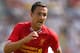PRESTON, LANCASHIRE - JULY 13: Stewart Downing of Liverpool runs with the ball during the Pre Season Friendly match between Preston North End and Liverpool at Deepdale on July 13, 2013 in Preston, Lancashire. (Photo by Alex Livesey/Getty Images)