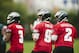 May 20, 2013; Philadelphia, PA, USA; Philadelphia Eagles quarterbacks fourth round draft pick Matt Barkley (2) Nick Foles (9) and Dennis Dixon (3) drop back to pass during organized team activities at the NovaCare Complex. Mandatory Credit: Howard Smith-USA TODAY Sports