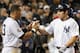 NEW YORK - NOVEMBER 04: Alex Rodriguez #13 of the New York Yankees congratulates Johnny Damon #18 after Damon scored in a 2-run single by Hideki Matsui #55 in the bottom of the third inning against the Philadelphia Phillies in Game Six of the 2009 MLB World Series at Yankee Stadium on November 4, 2009 in the Bronx borough of New York City. (Photo by Jed Jacobsohn/Getty Images)