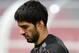 BANGKOK, THAILAND - JULY 27: Luis Suarez looks on during a Liverpool FC training session at Rajamangala Stadium on July 27, 2013 in Bangkok, Thailand. (Photo by Thananuwat Srirasant/Getty Images)