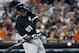 DETROIT, MI - JULY 9: Alex Rios #51 of the Chicago White Sox hits a single against the Detroit Tigers in the fifth inning at Comerica Park on July 9, 2013 in Detroit, Michigan. Rios went 6-for-6 at the plate in a 11-4 win over the Tigers. (Photo by Duane Burleson/Getty Images)