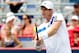 MONTREAL, QC - AUGUST 07: Andy Murray of Great Britain returns a shot to Marcel Granollers of Spain during the Rogers Cup at Uniprix Stadium on August 7, 2013 in Montreal, Quebec, Canada. (Photo by Matthew Stockman/Getty Images)