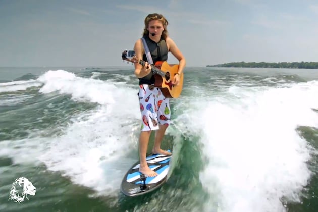 Guy Surfs, Parasails All While Playing Guitar