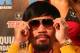BEVERLY HILLS, CA - AUGUST 08: Manny Pacquiao puts on his sunglasses at a press conference previewing the upcoming match against Brandon Rios at Beverly Hills Hotel on August 8, 2013 in Beverly Hills, California. (Photo by Stephen Dunn/Getty Images)