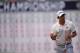 ROCHESTER, NY - AUGUST 08: Adam Scott of Australia saves par on the 18th hole during the first round of the 95th PGA Championship on August 8, 2013 in Rochester, New York. (Photo by Stuart Franklin/Getty Images)