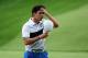 ROCHESTER, NY - AUGUST 08: Rory McIlroy of Northern Ireland walks off the 18th green during the first round of the 95th PGA Championship on August 8, 2013 in Rochester, New York. (Photo by Andrew Redington/Getty Images)