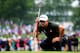 ROCHESTER, NY - AUGUST 09: Adam Scott of Australia lines up his putt on the fourth green during the second round of the 95th PGA Championship on August 9, 2013 in Rochester, New York. (Photo by Sam Greenwood/Getty Images)