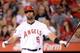 ANAHEIM, CA - MAY 21: Albert Pujols #5 of the Los Angeles Angels reacts to his strikeout during the third inning against the Seattle Mariners at Angel Stadium of Anaheim on May 21, 2013 in Anaheim, California. (Photo by Harry How/Getty Images)