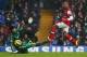 LONDON, ENGLAND - JANUARY 20: Petr Cech of Chelsea attempts to stop Theo Walcott of Arsenal during the Barclays Premier League match between Chelsea and Arsenal at Stamford Bridge on January 20, 2013 in London, England. (Photo by Clive Rose/Getty Images)