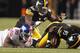Aug 10, 2013; Pittsburgh, PA, USA; Pittsburgh Steelers linebacker Jarvis Jones (95) recovers a fumble by New York Giants running back Andre Brown (35) during the second quarter at Heinz Field. Mandatory Credit: Charles LeClaire-USA TODAY Sports