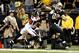 November 11, 2012; New Orleans, LA, USA; New Orleans Saints tight end Jimmy Graham (80) is pushed out of bounds by Atlanta Falcons free safety Thomas DeCoud (28) during the fourth quarter of a game at the Mercedes-Benz Superdome. The Saints defeated the Falcons 31-27. Mandatory Credit: Derick E. Hingle-USA TODAY Sports