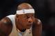 DENVER - NOVEMBER 16: Al Harrington #7 of the Denver Nuggets prepares to take a free throw against the New York Knicks at the Pepsi Center on November 16, 2010 in Denver, Colorado. The Nuggets defeated the Knicks 120-118. NOTE TO USER: User expressly acknowledges and agrees that, by downloading and/or using this Photograph, User is consenting to the terms and conditions of the Getty Images License Agreement. (Photo by Doug Pensinger/Getty Images)