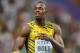 Aug 11, 2013; Moscow, RUSSIA; Usain Bolt (JAM) takes a victory lap after winning the 100m in 9.77 in the 14th IAAF World Championships in Athletics at Luzhniki Stadium. Mandatory Credit: Kirby Lee-USA TODAY Sports
