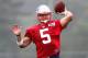 FOXBORO, MA - JULY 26: Tim Tebow #5 throws during the first day of New England Patriots Training Camp at Gillette Stadium on July 26, 2013 in Foxboro, Massachusetts. (Photo by Jim Rogash/Getty Images)