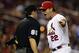 Mike Matheny argues with plate umpire David Rackley on Aug. 9. Matheny was later ejected.