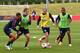 BURTON-UPON-TRENT, ENGLAND - AUGUST 12: Wayne Rooney of England takes on Jack Wilshere, Kyle Walker and Theo Walcott during a training session at St Georges Park on August 12, 2013 in Burton-upon-Trent, England. (Photo by Alex Livesey/Getty Images)